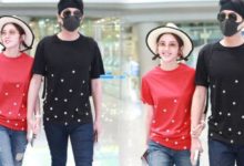 唐藝昕與張若昀機場終於合體，穿紅黑配情侶裝扎牛角辮甜的像學生-酷播亮新聞